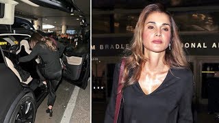 Queen Rania Of Jordan Hops Into A Matte Black Tesla Upon Arrival In Los Angeles [upl. by Nalyad974]