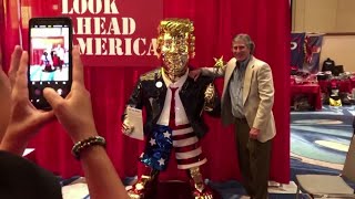 Trump’s golden statue unveiled at the CPAC [upl. by Yasu228]