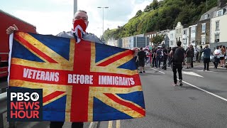 Record migrant English Channel crossings drive rightwing backlash in UK [upl. by Arratal814]