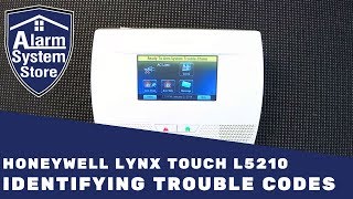 How To Clear Trouble Conditions On Honeywell Lynx L5210  AlarmSystemStore [upl. by Nesnej]