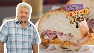 Guy Fieri Eats a Peruvian Chicharron Sandwich  Diners DriveIns and Dives  Food Network [upl. by Gosser]