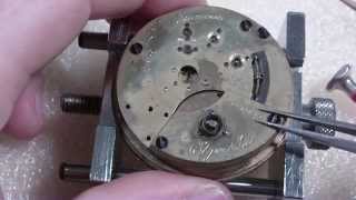 How I install a pocket watch mainspring Elgin [upl. by Kubetz446]