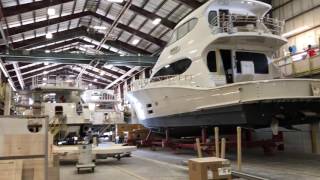 Hatteras factory tour Denison Yachting [upl. by Nileuqcaj]