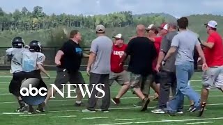 Coaches parents throw punches at youth football game [upl. by Aneloaup161]