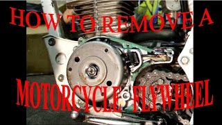 HOW TO REMOVE A MOTORCYCLE FLYWHEEL [upl. by Ojahtnamas]